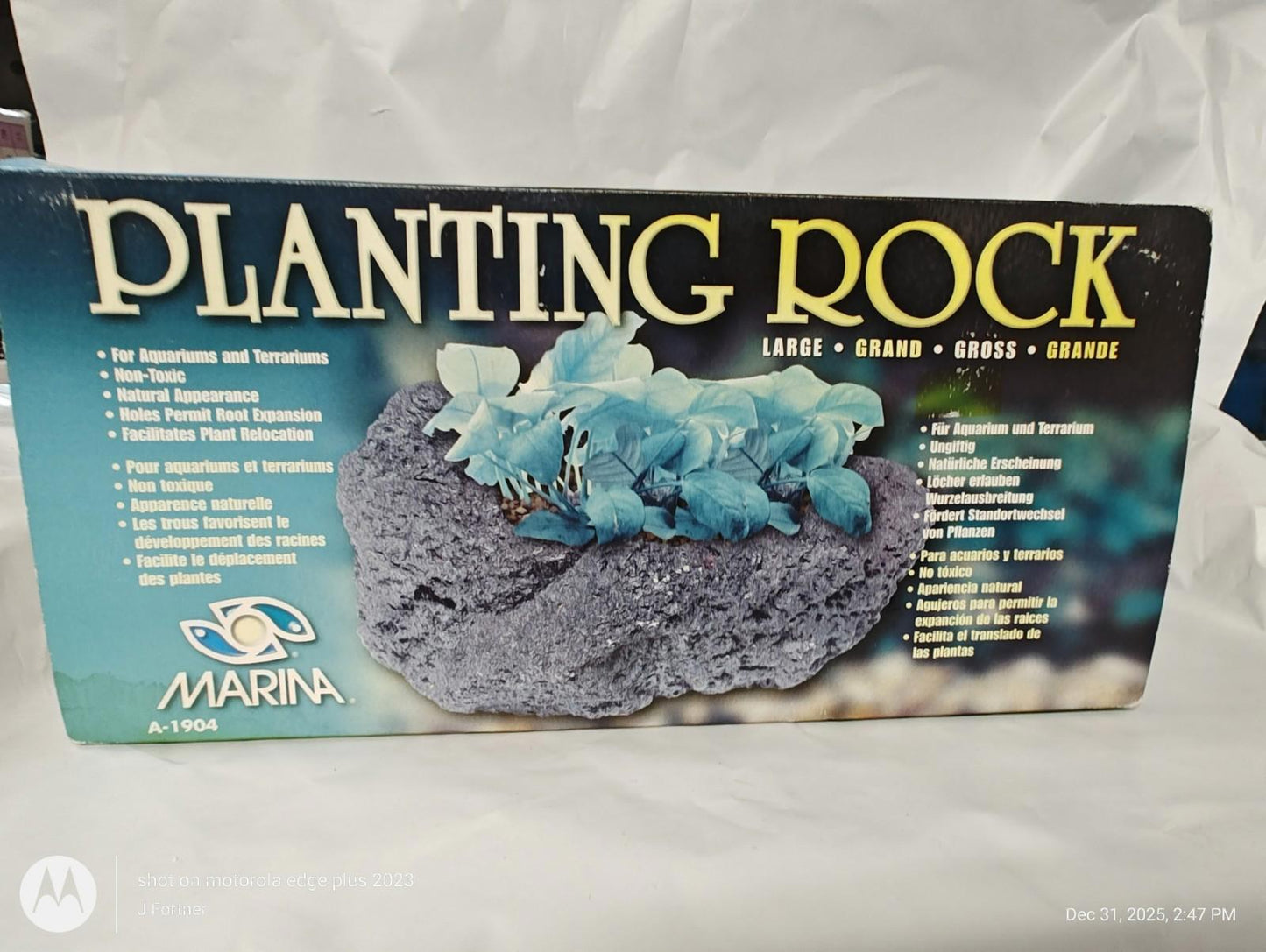 Planting Rock by Marina, designed for aquariums with realistic texture and vibrant blue plants.