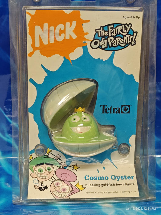 Cosmo Oyster from The Fairly OddParents, a green bubbling goldfish bowl figure in packaging.