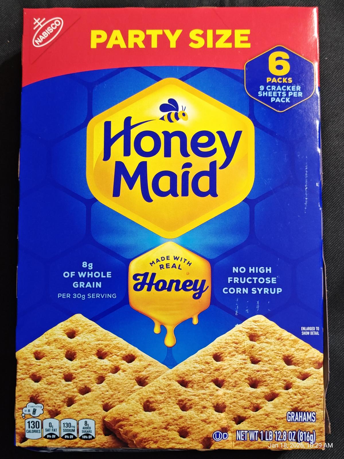 Honey Maid graham crackers in party size packaging, featuring 6 packs and made with real honey.