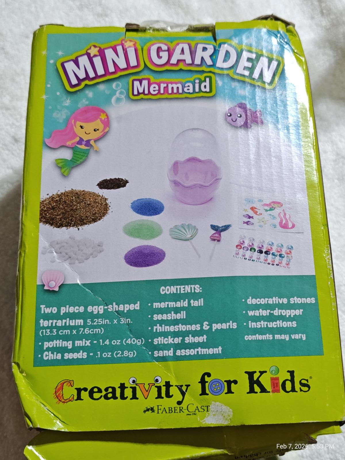 Mini Garden Mermaid kit featuring a terrarium, decorative stones, and accessories for kids.