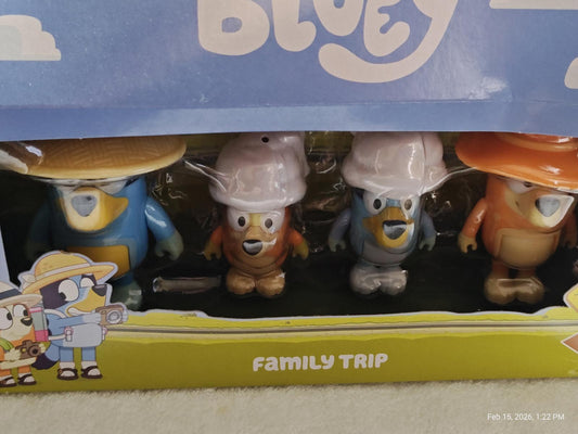 Bluey Family Trip toy set featuring four colorful characters in hats.