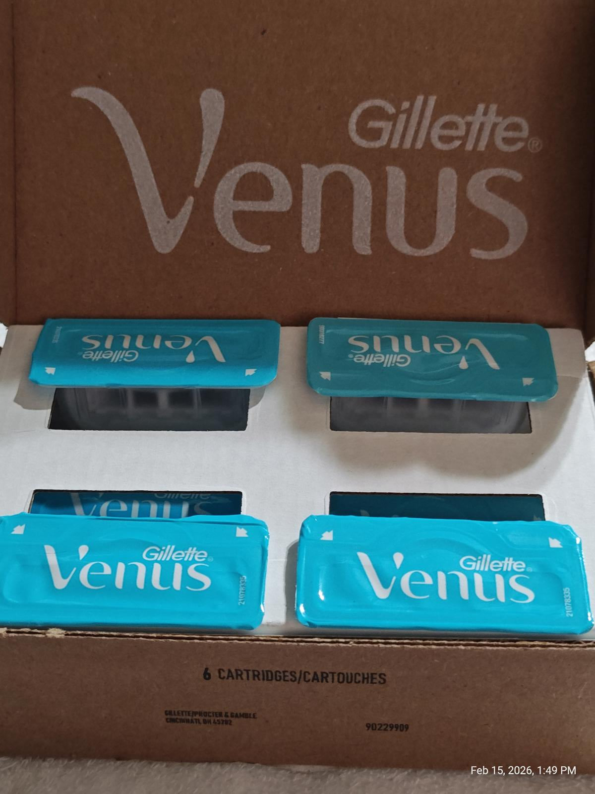 Gillette Venus razor cartridges in a blue packaging, featuring six cartridges for smooth shaving.