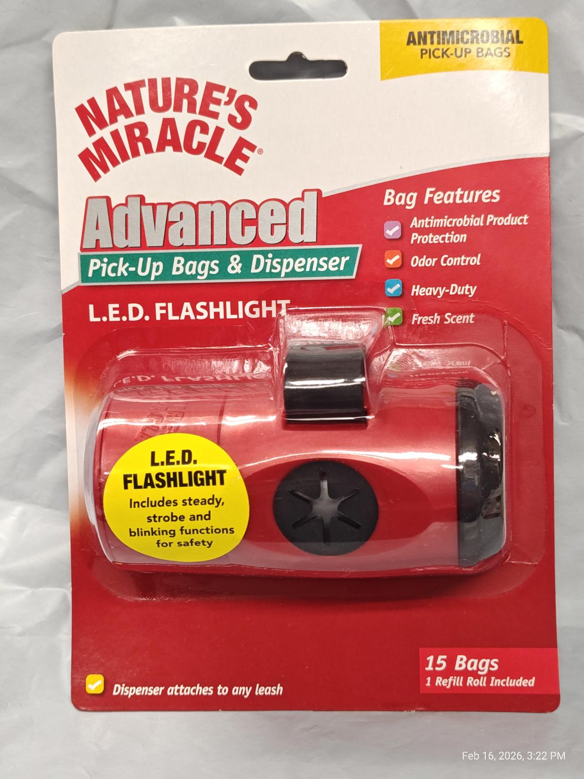 Nature's Miracle Advanced L.E.D. flashlight with antimicrobial pick-up bags and dispenser features.