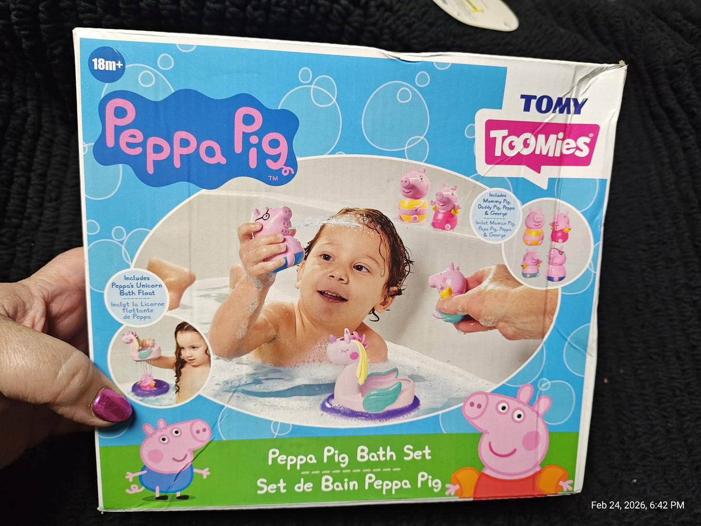 Peppa Pig Bath Set featuring a child playing with colorful bath toys in a tub.