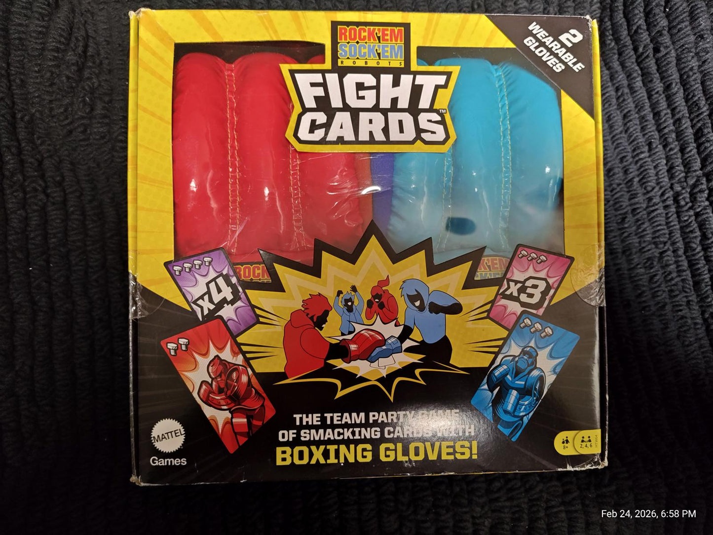 Fight Cards boxing gloves set in red and blue packaging, featuring cartoon characters and game details.