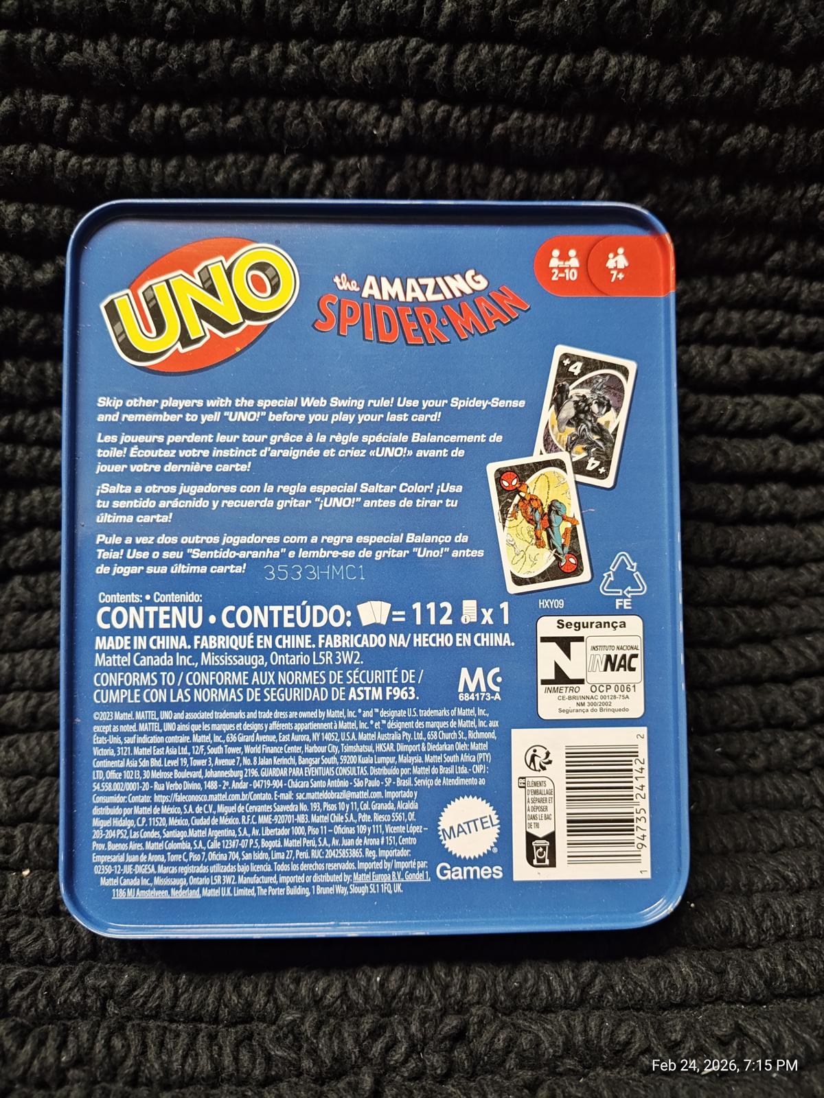 UNO The Amazing Spider-Man card game featuring colorful superhero graphics and game details.