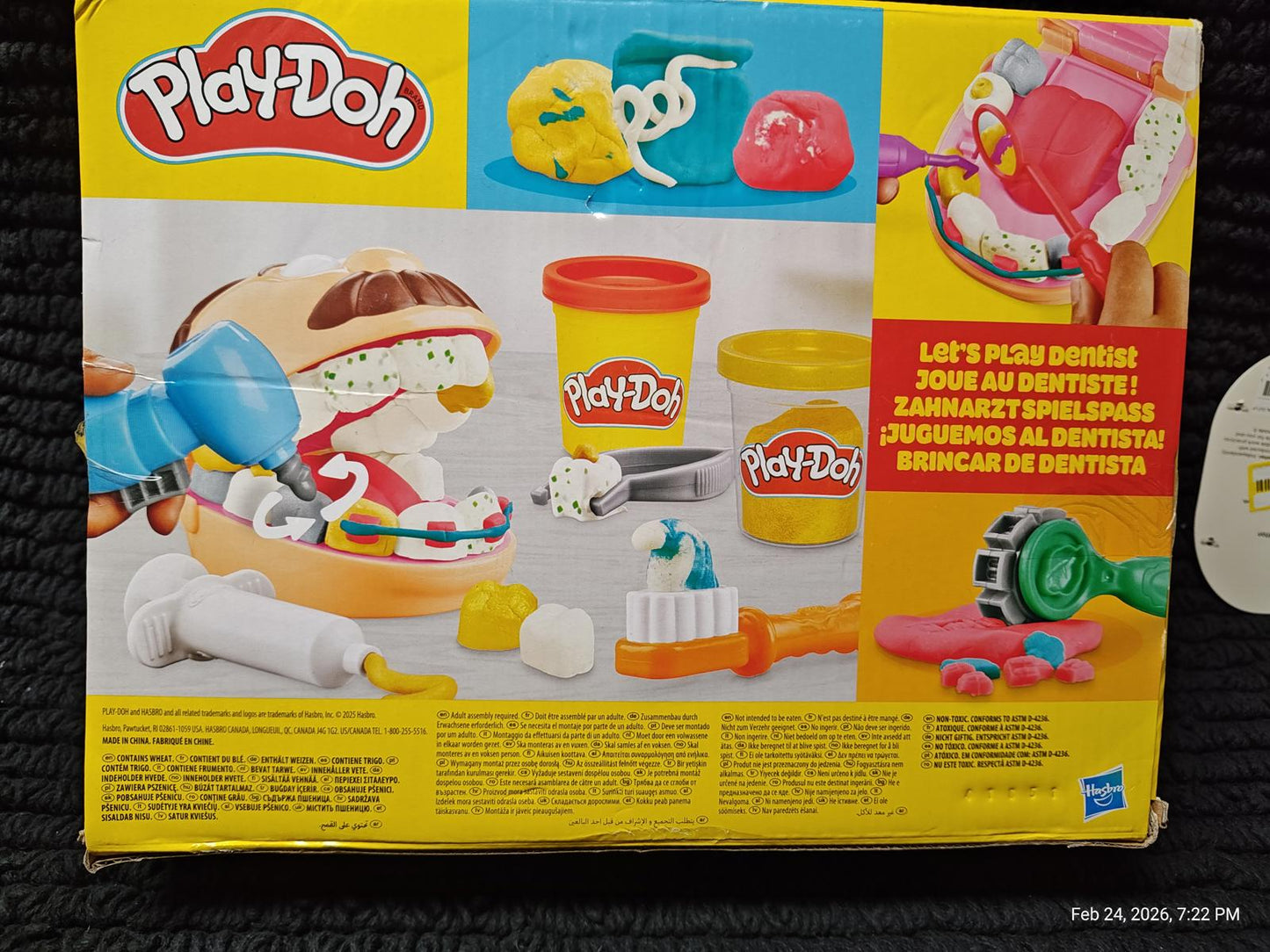 Play-Doh dentist set featuring colorful tools, dental accessories, and a toy patient.