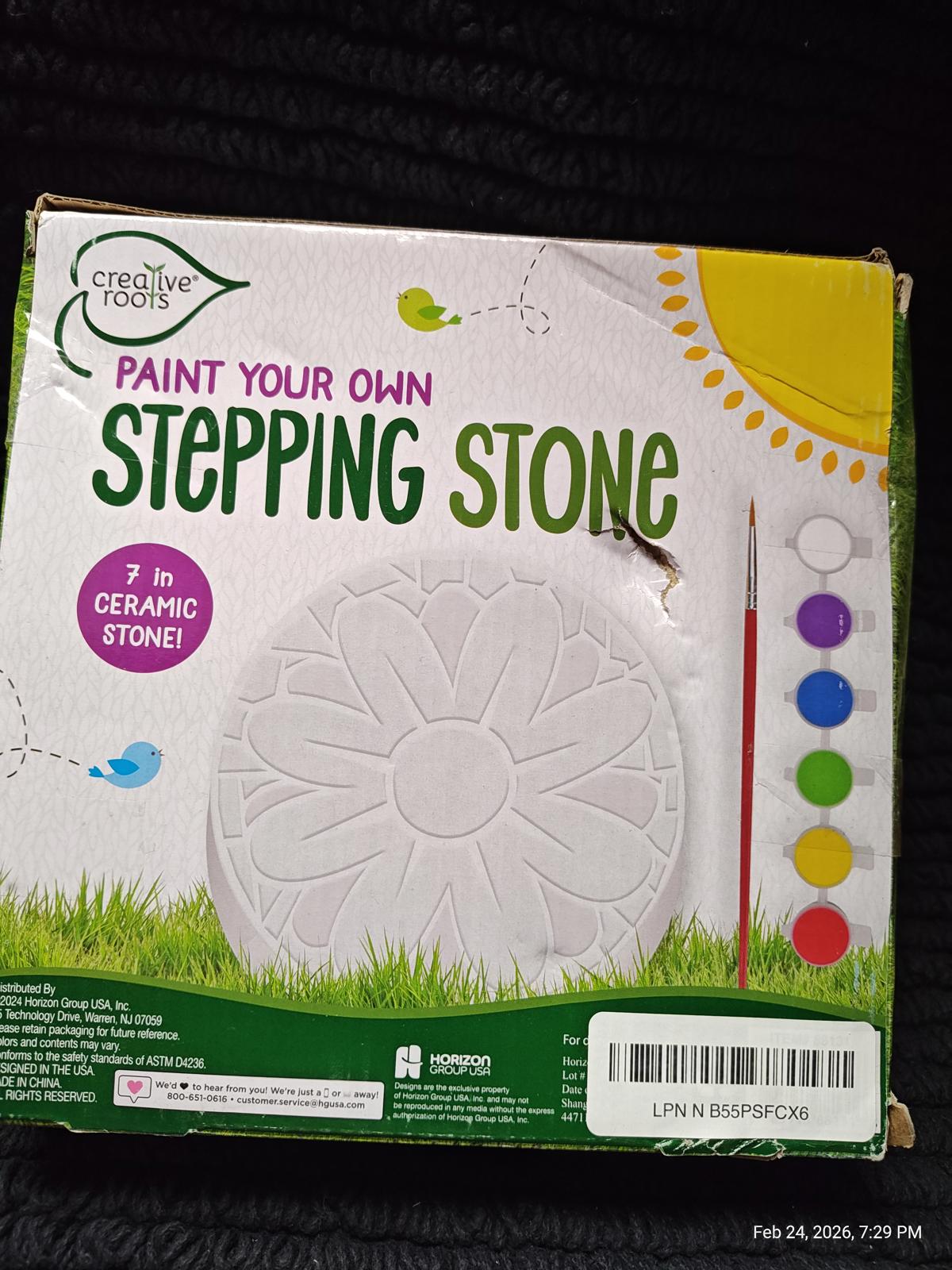 Paint Your Own Stepping Stone kit with flower design and paint colors included.