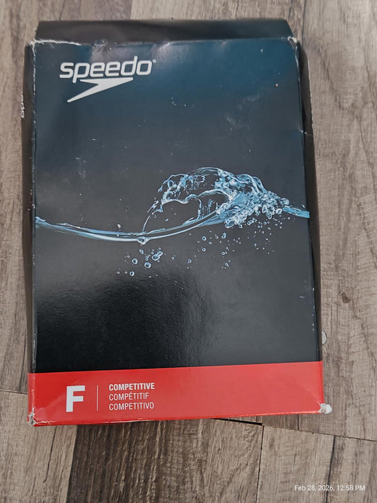 Speedo competitive swim cap packaging featuring water splash design.