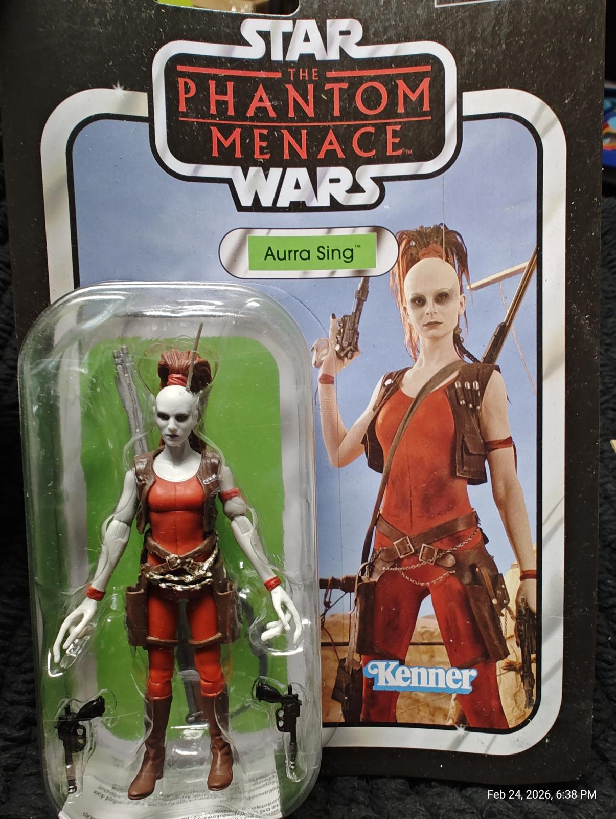 Aayla Secura action figure from Star Wars: The Phantom Menace, featuring detailed costume and accessories.