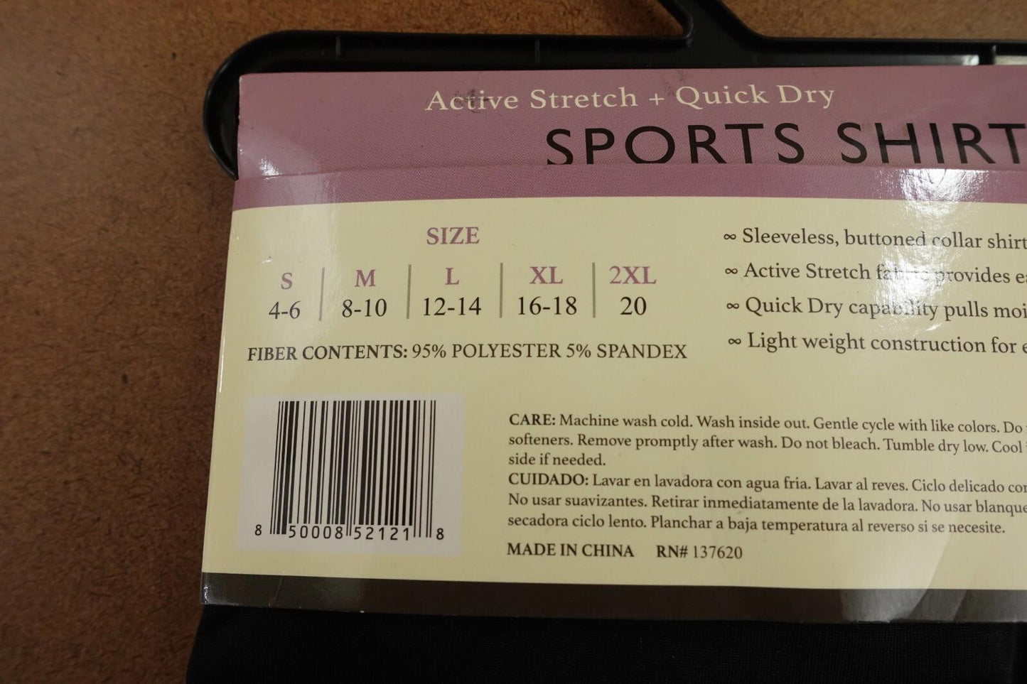 Sports shirt size chart showing sizes from S to 2XL with fiber content details.