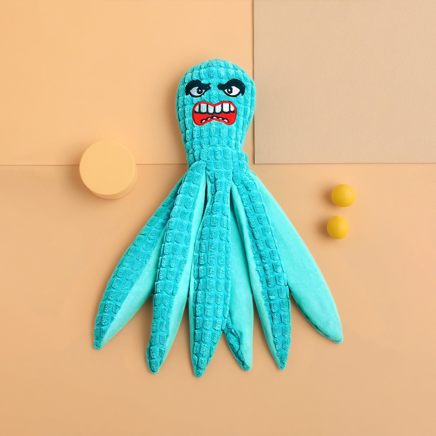 Angry Octopus Plush Toy in vibrant turquoise color with expressive facial features.