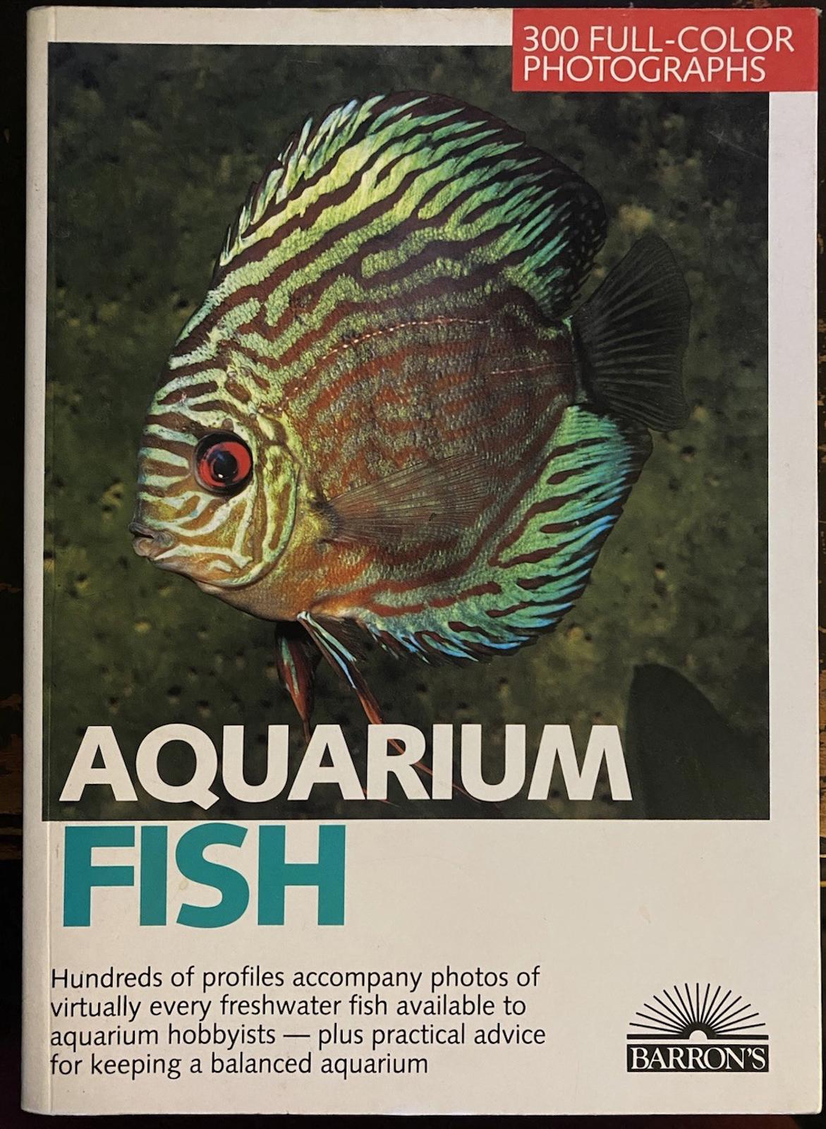 Aquarium Fish book cover featuring a colorful discus fish, ideal for hobbyists.
