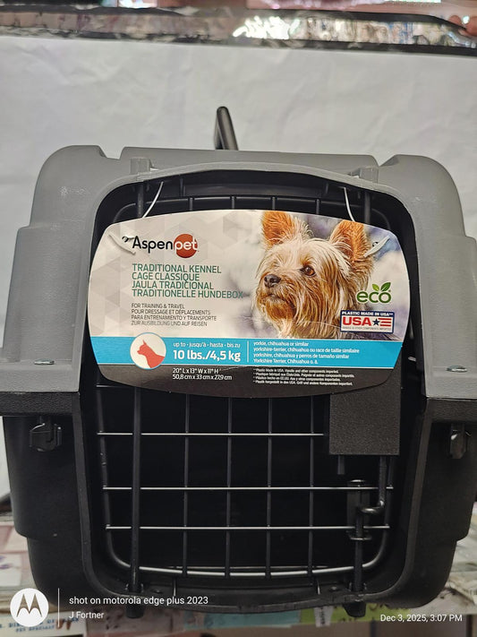 Aspen Pet traditional kennel for pets up to 10 lbs, featuring a sturdy design and eco-friendly materials.