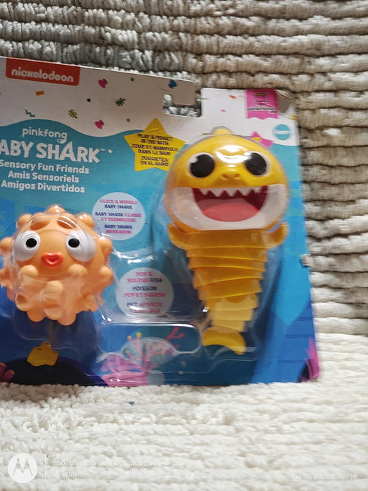 Baby Shark sensory fun friends set featuring a yellow shark and orange pufferfish.