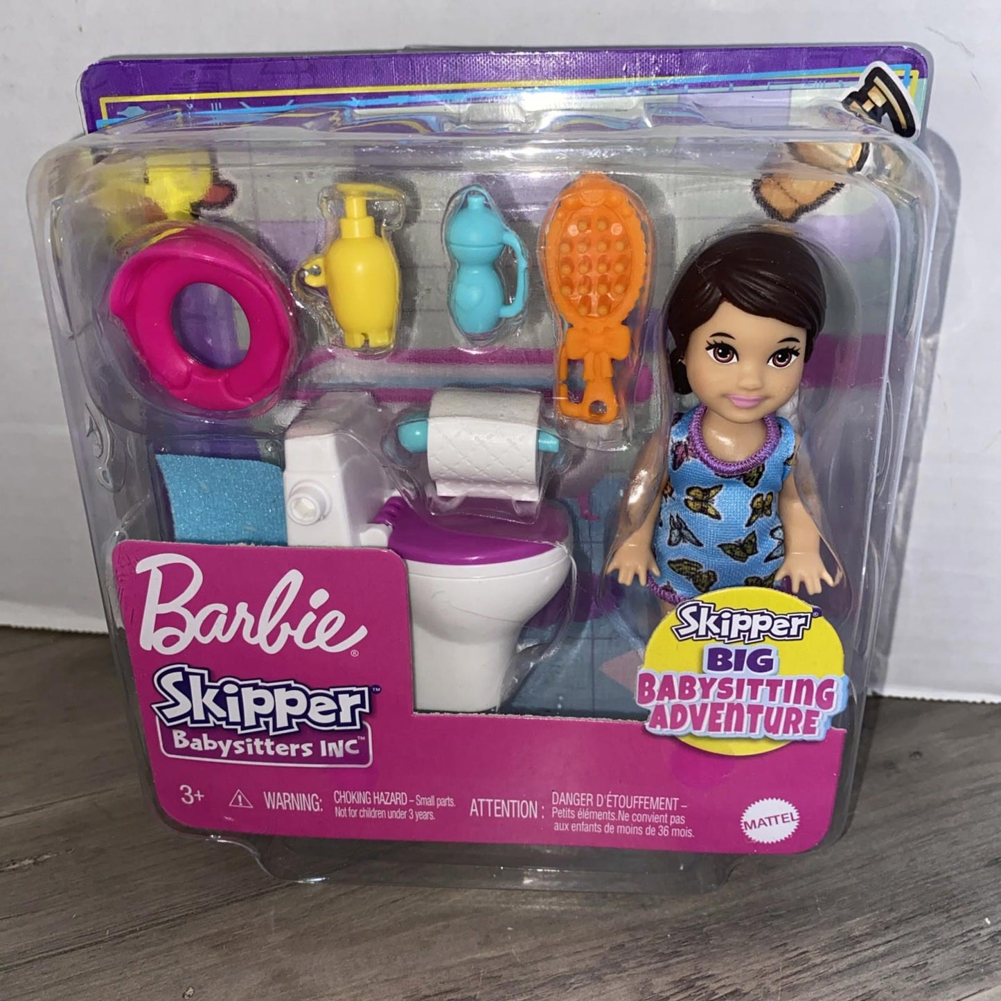 Barbie Skipper Babysitting Adventure playset featuring a doll, toilet, and accessories.