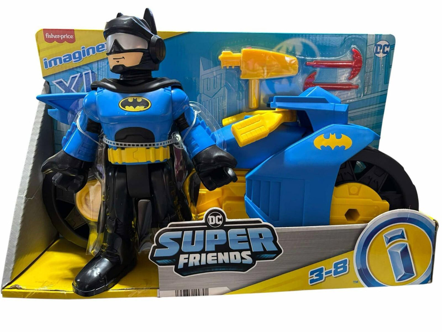 Batman action figure with blue and yellow motorcycle from DC Super Friends.