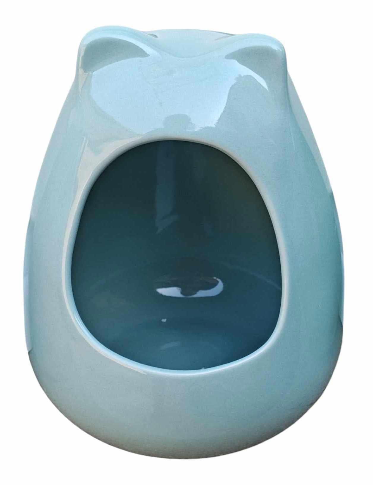 Bear-shaped pet house in light blue color, featuring a cozy entrance for small animals.
