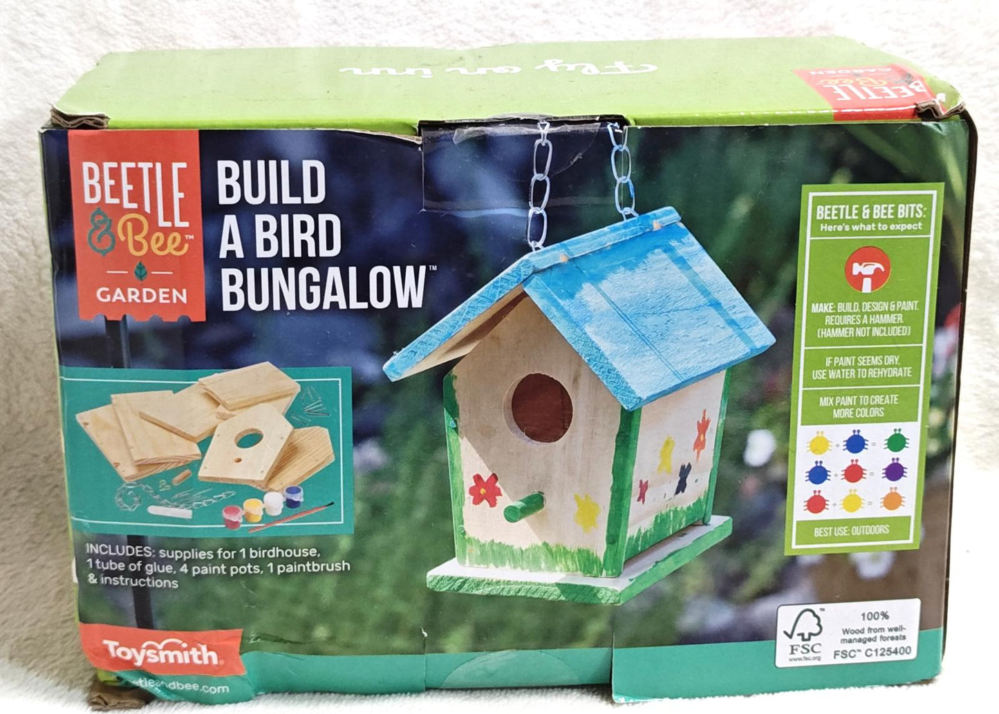 Beetle & Bee Build a Bird Bungalow kit featuring a colorful birdhouse with accessories.