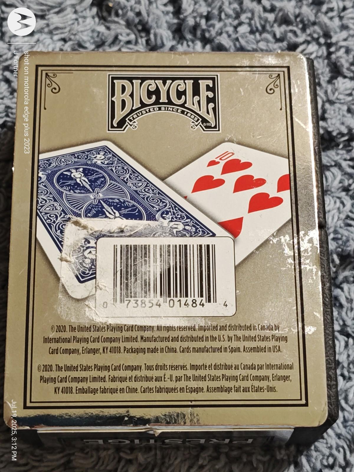 Bicycle playing cards box featuring red hearts and blue back design.