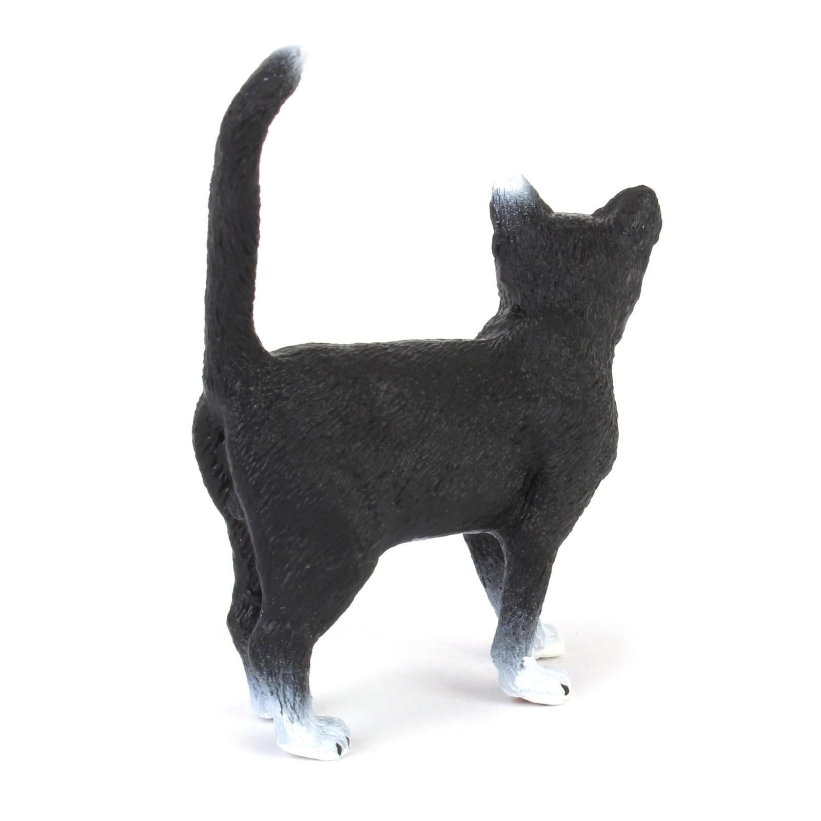 Black Cat Figurine with white paws and tail tip, detailed craftsmanship.