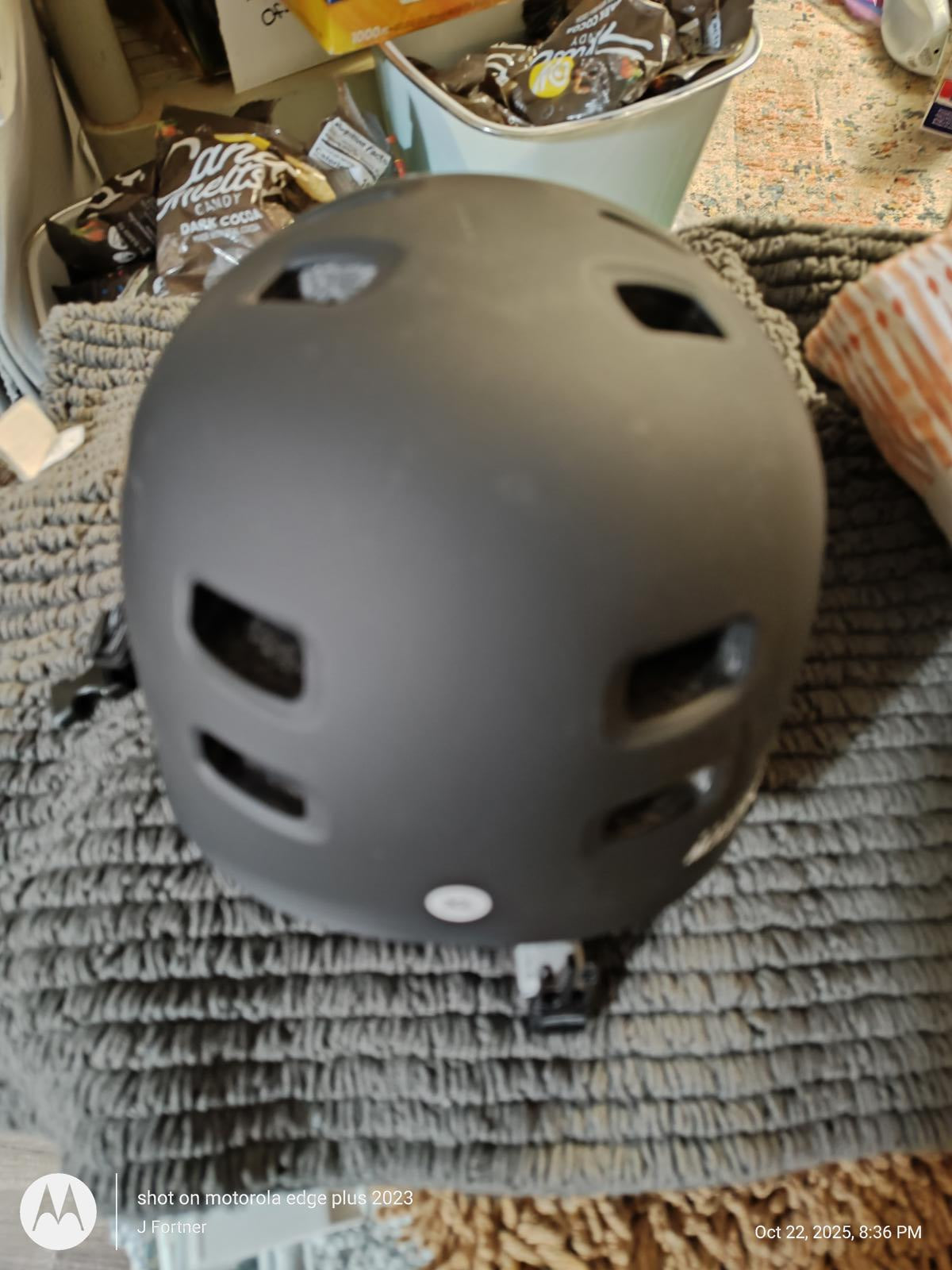 Black Skate Helmet with ventilation holes and adjustable straps.