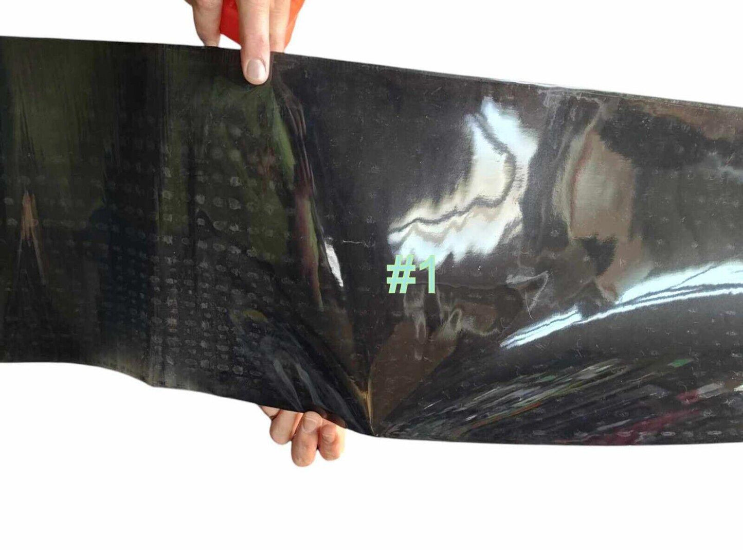 Black vinyl wrap featuring a glossy finish and a green #1 design.