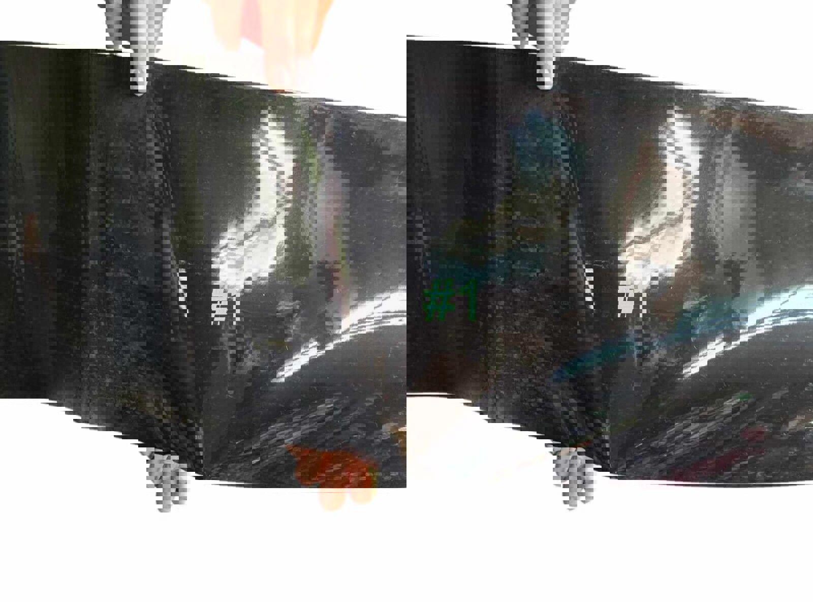 Black vinyl wrap featuring a glossy finish and a green #1 design.