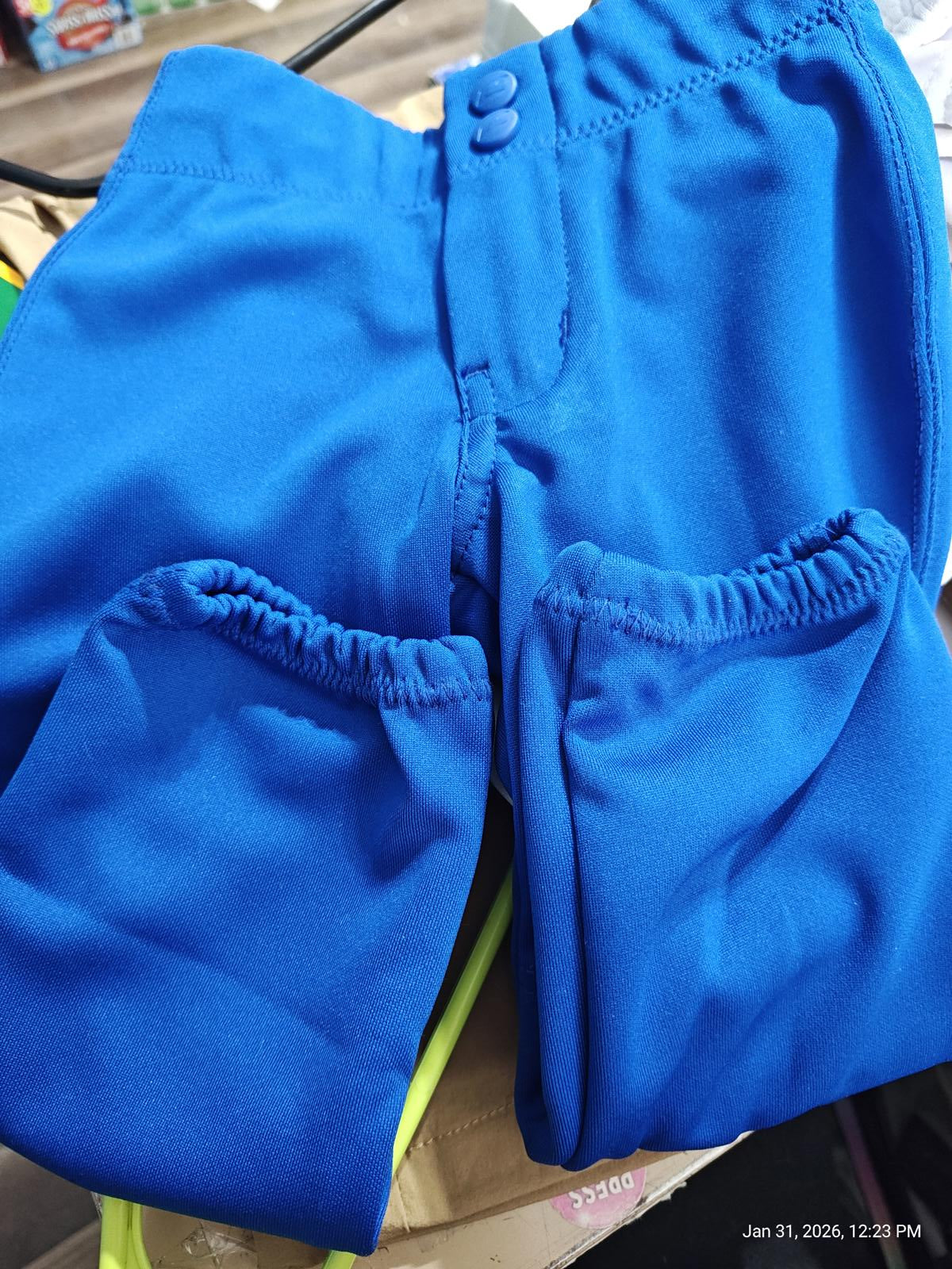 Blue Swim Shorts featuring elastic waistband and side pockets.