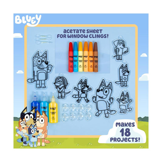 Bluey acetate sheet for window clings with colorful markers and project materials.