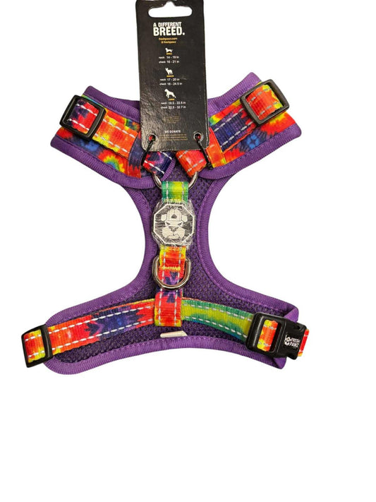 Breeo rainbow dog harness featuring a vibrant multicolor design and adjustable straps.
