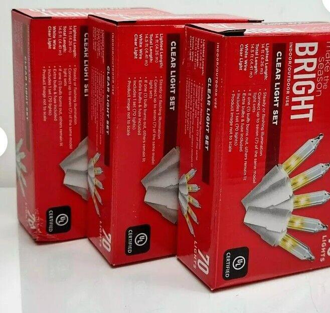 Bright clear light set with multiple bulbs in red packaging, ideal for festive decorations.