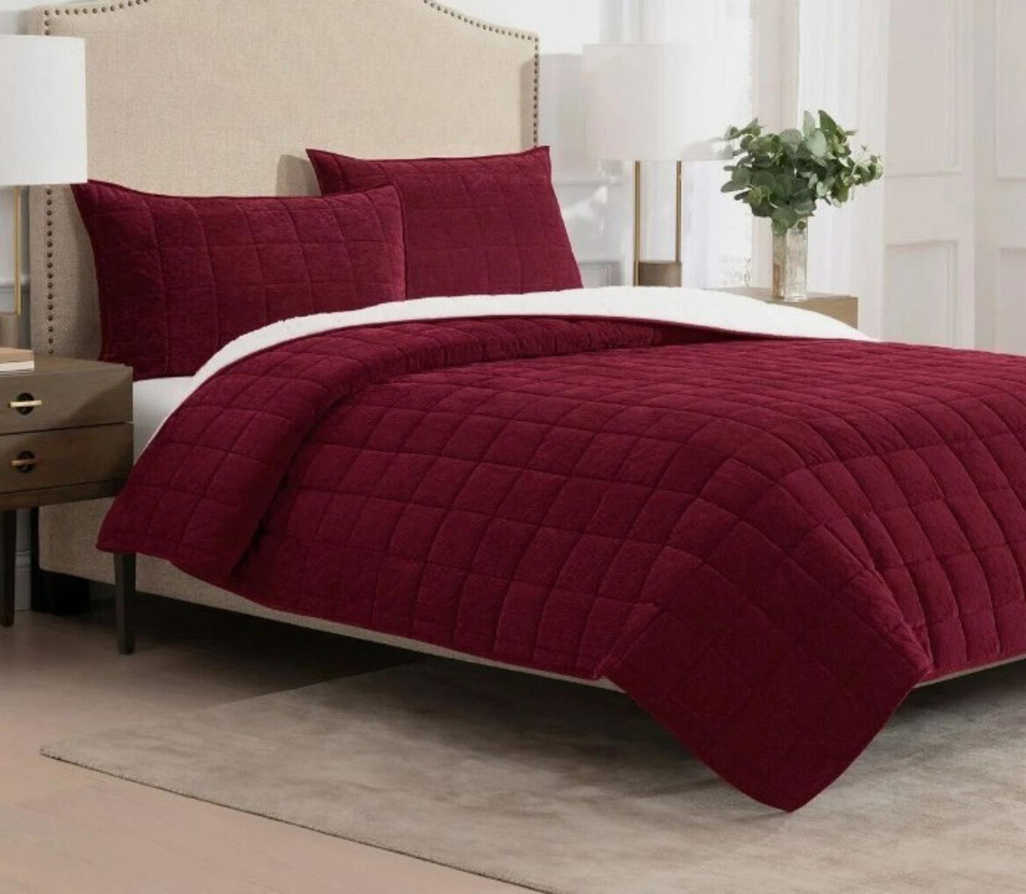 Burgundy quilt set featuring a textured design with matching pillow shams.