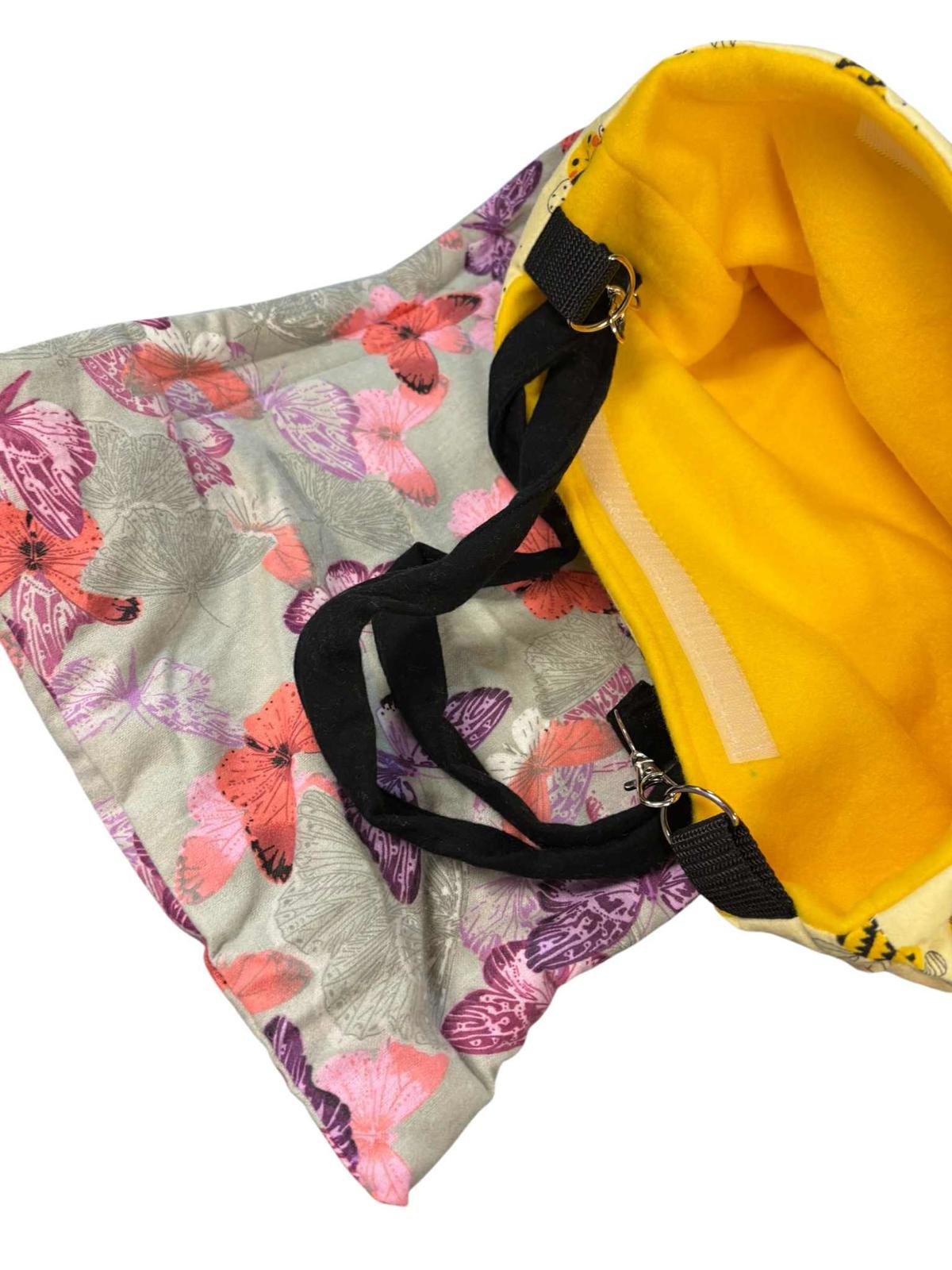 Butterfly Tote Bag with vibrant floral design and yellow interior.