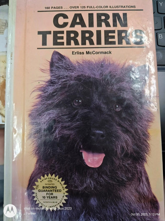 Cairn Terriers book cover featuring a fluffy black Cairn Terrier dog.