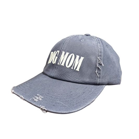 Dog Mom cap featuring a distressed design and adjustable strap.