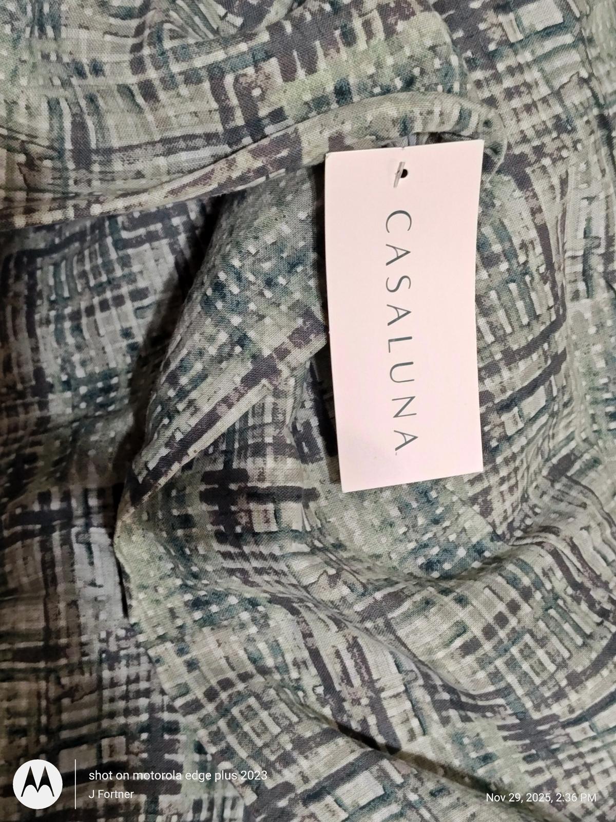 Casaluna patterned fabric featuring a blend of green and gray tones.