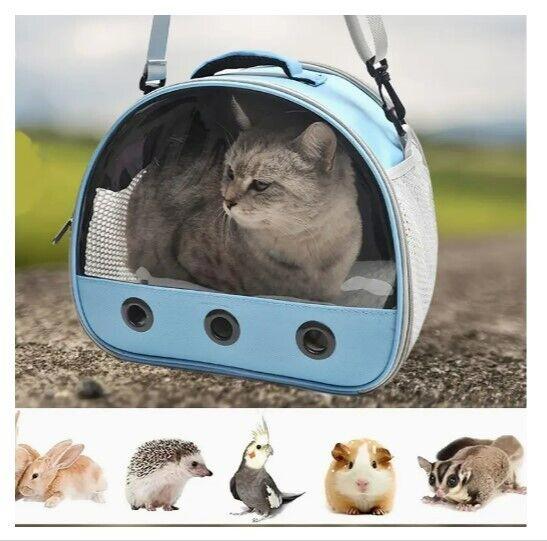 Cat carrier bag in blue color with mesh panels for ventilation, featuring a comfortable interior.