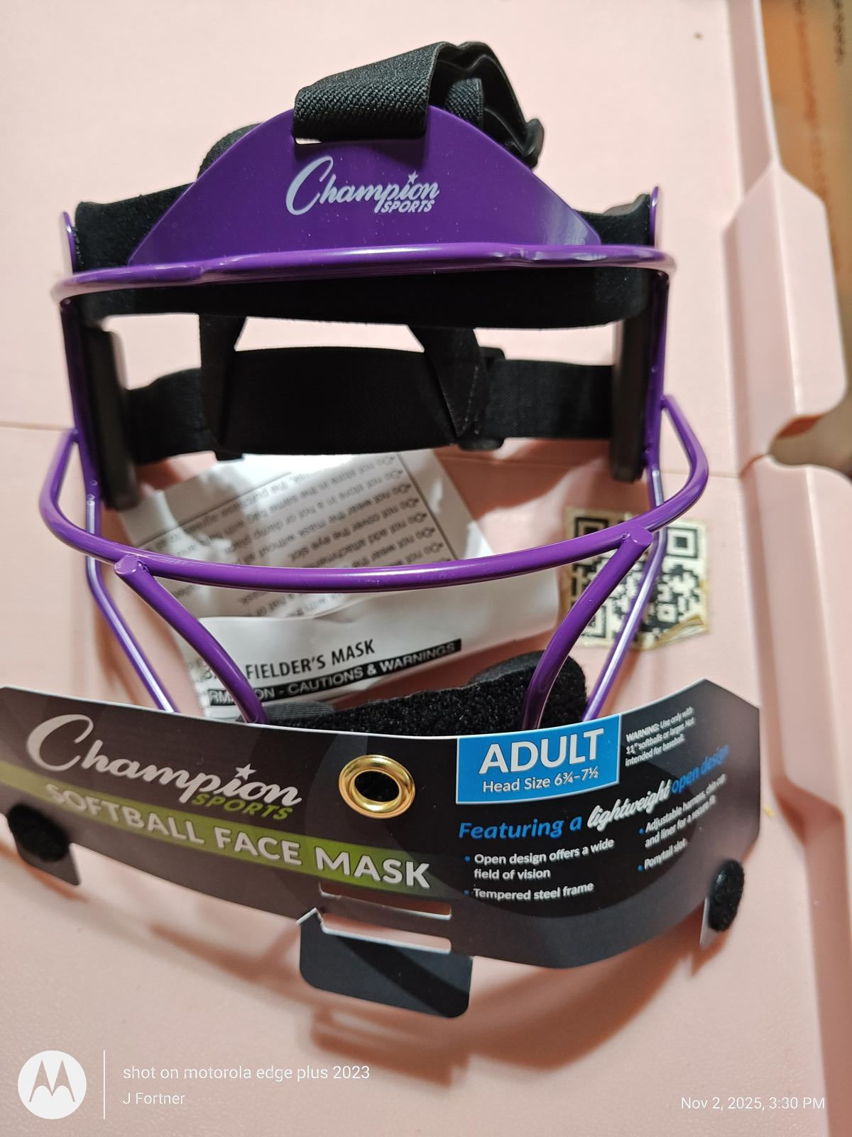 Champion football face mask in purple color with adjustable straps for adult sizes.
