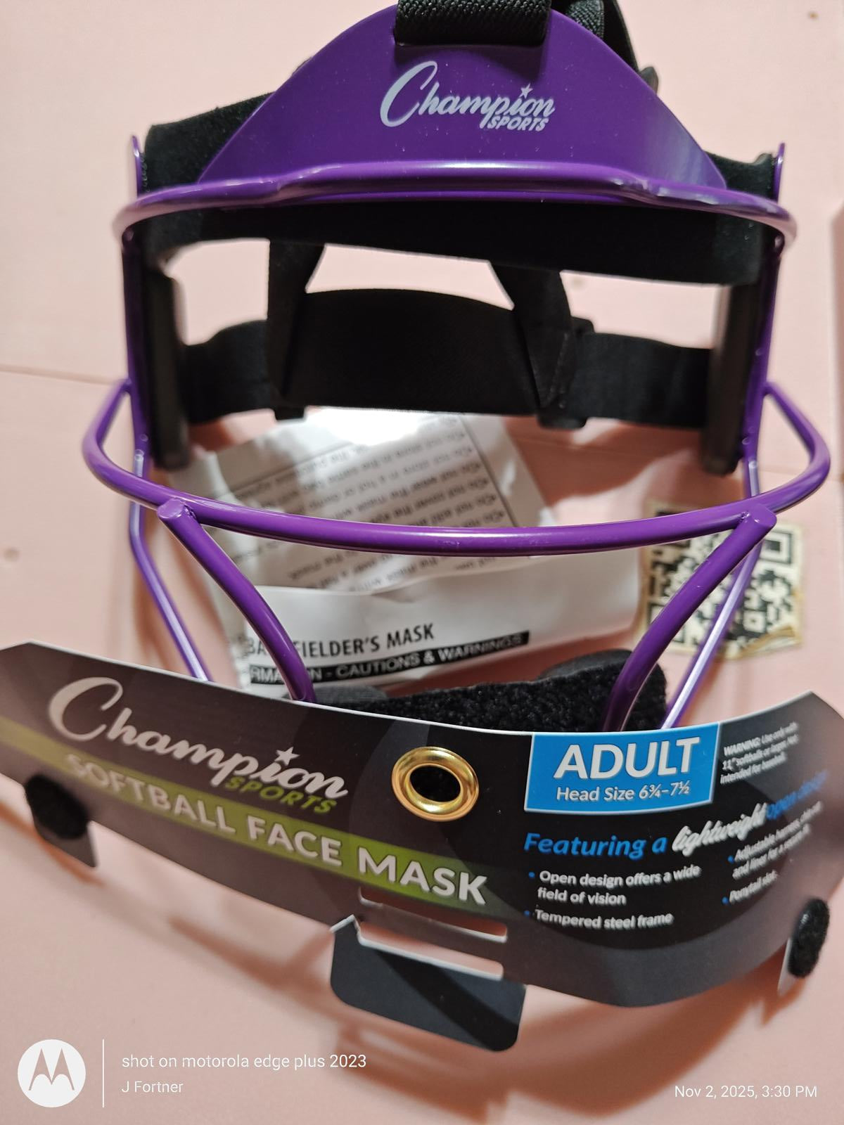 Champion Sports football face mask in purple color, designed for adult head sizes 6.5-7.5.