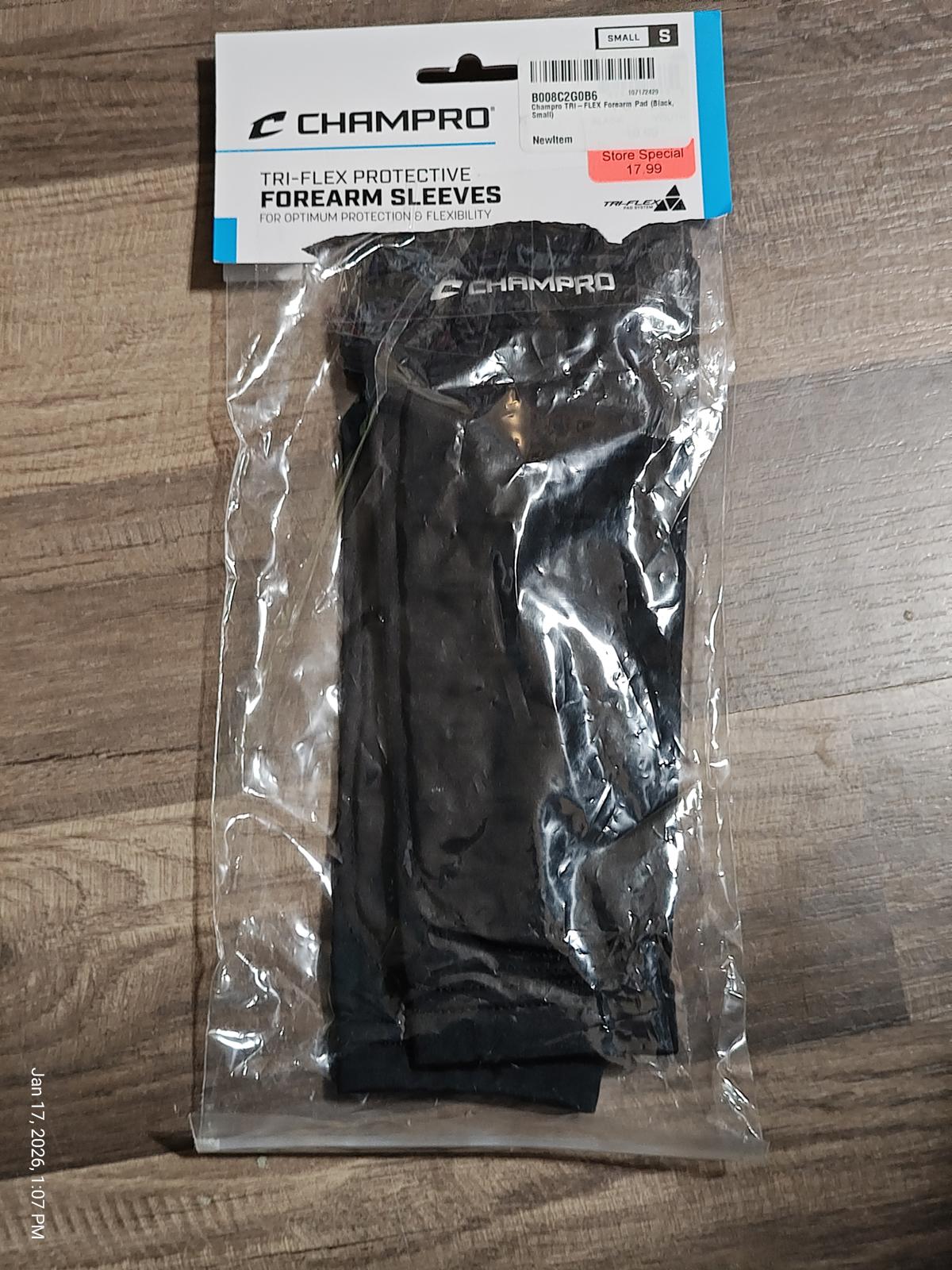 Champro TBI-Flex protective forearm sleeves in black packaging.