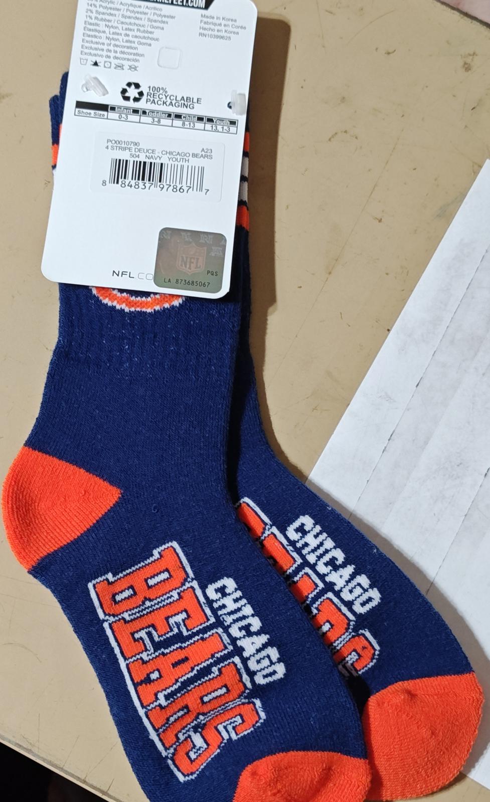 Chicago Bears socks featuring vibrant blue and orange colors with team logo.