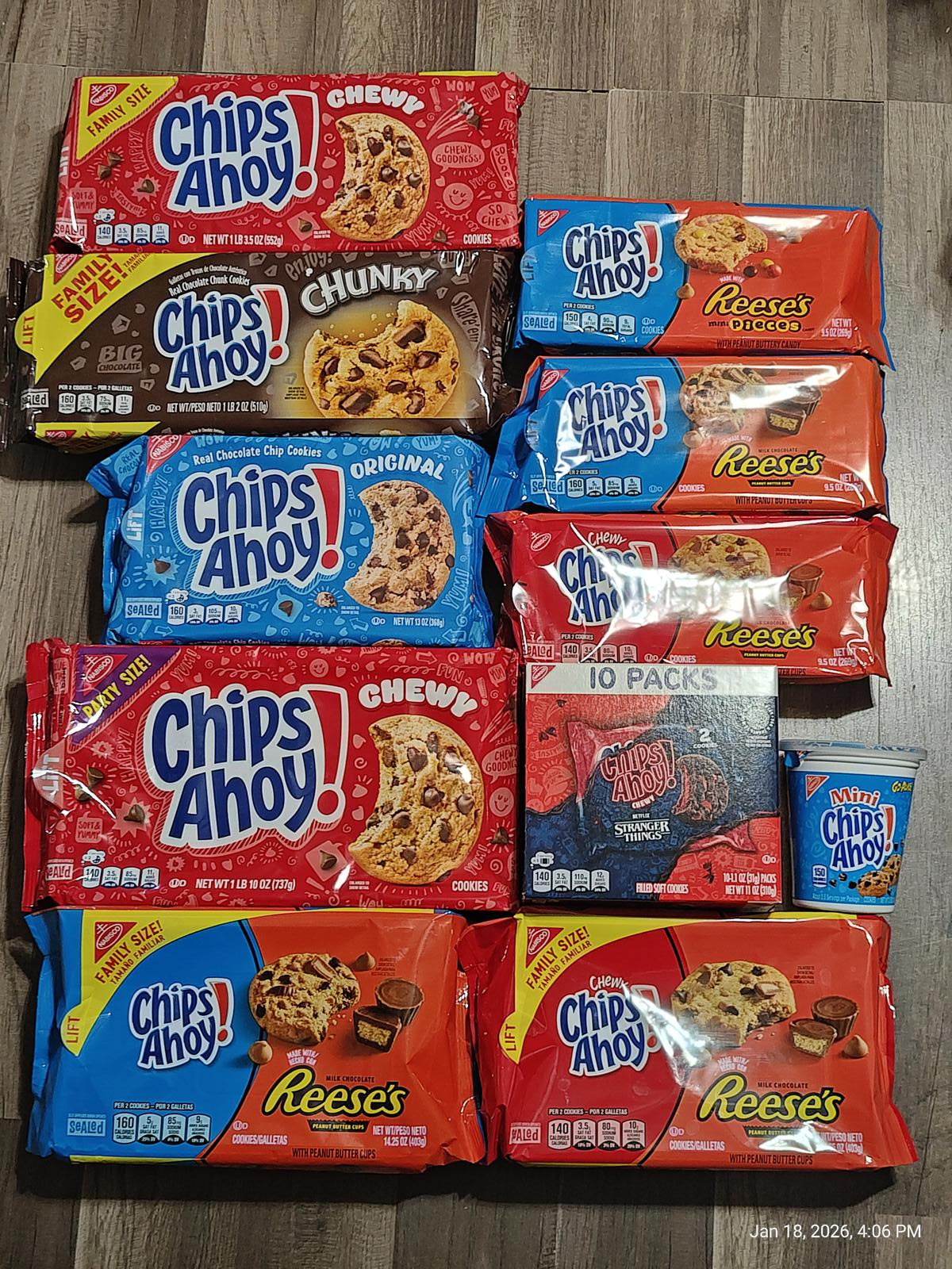 Chips Ahoy! cookie variety pack featuring chewy, chunky, and Reese's flavors on a wooden surface.