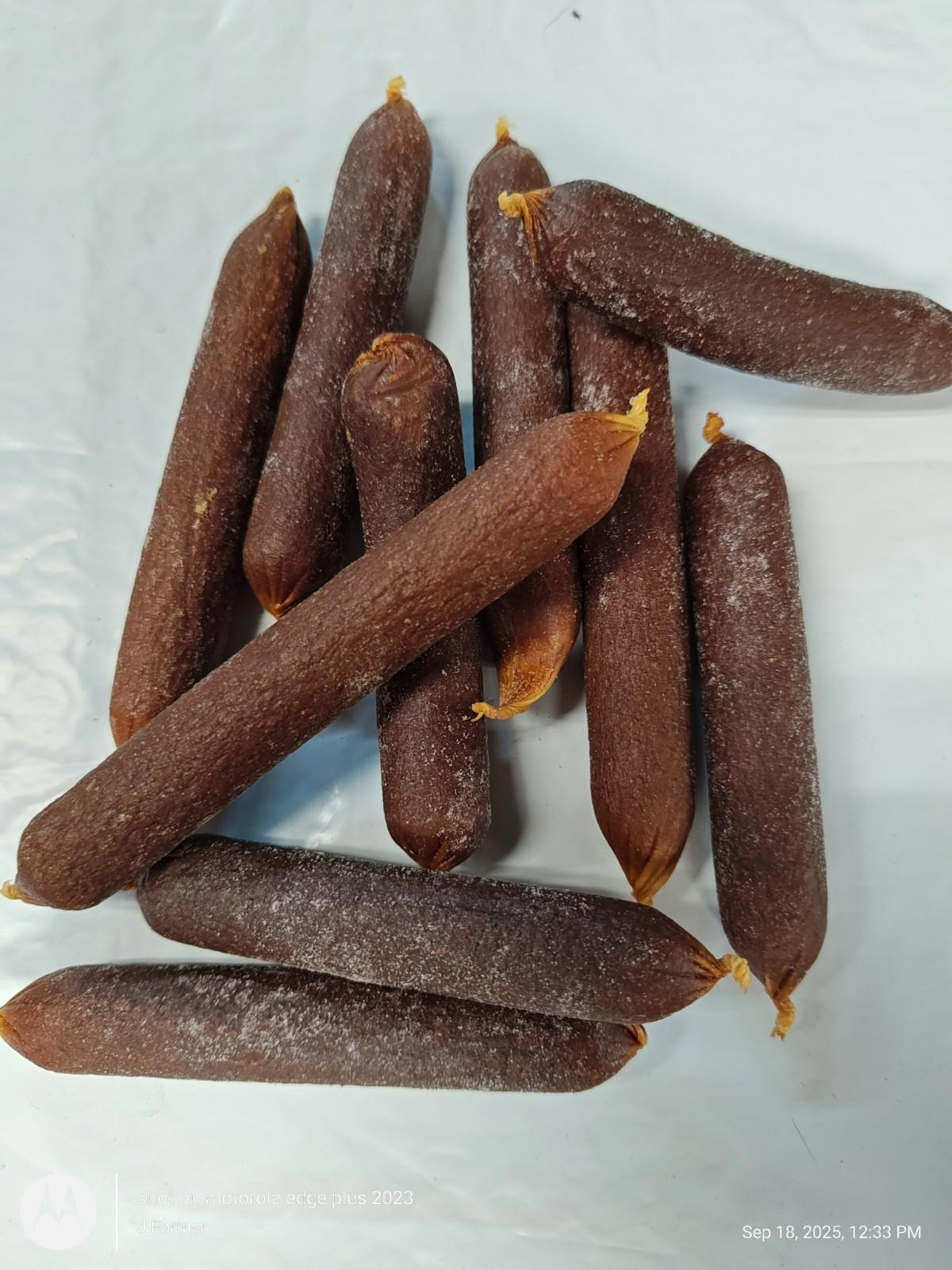 Chocolate Protein Bars stacked together, featuring a rich brown color and a smooth texture.