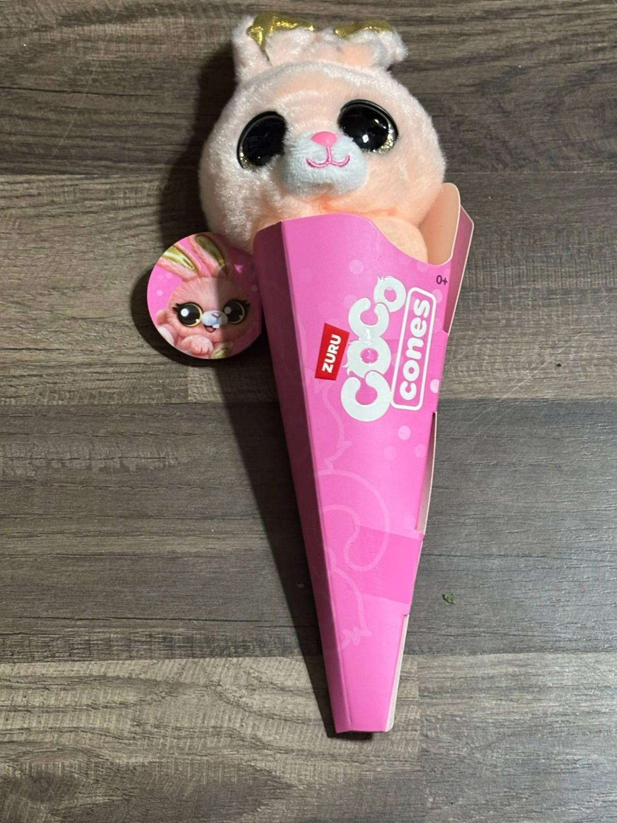 Coco Cones plush toy in pink cone packaging with a cute bunny design and a matching button.