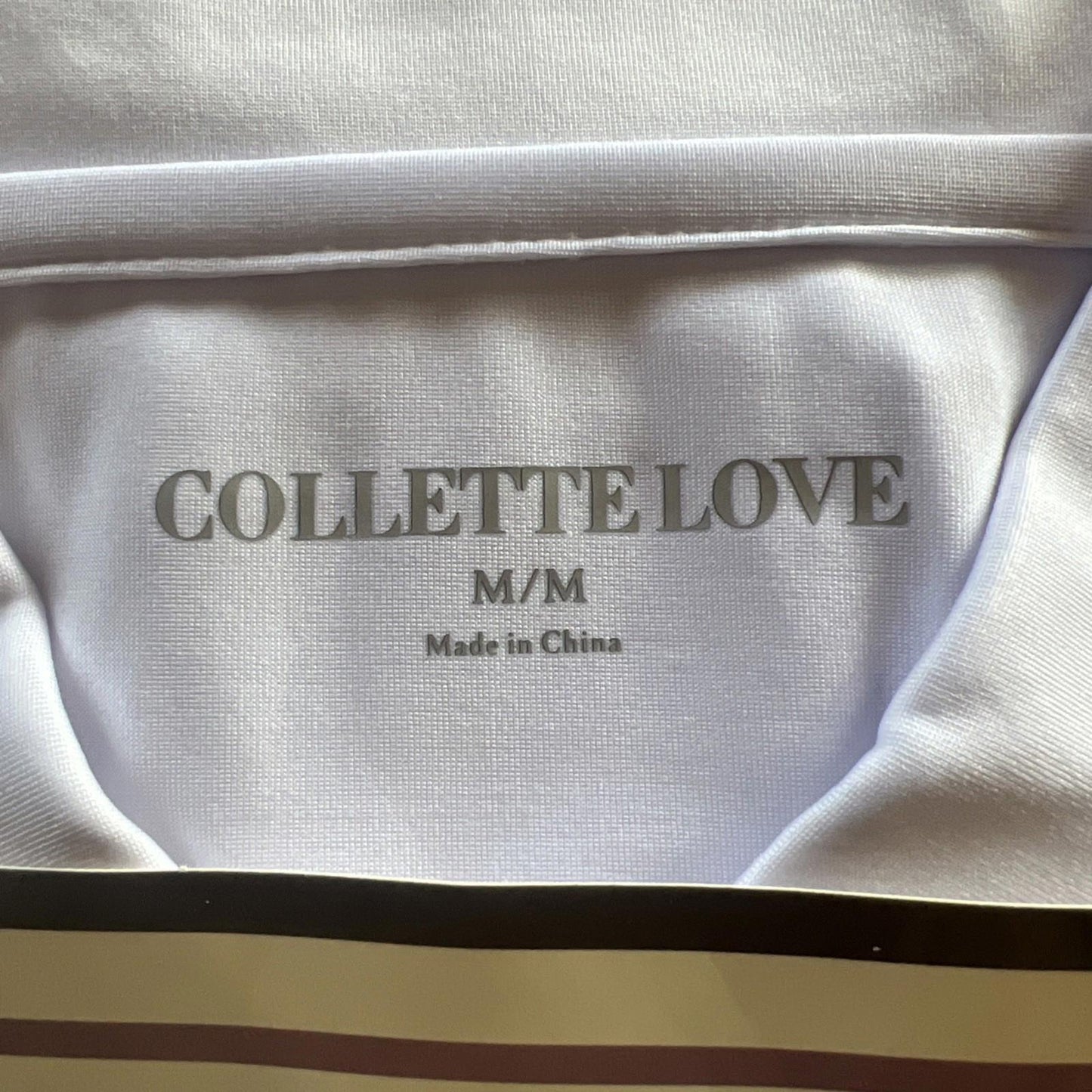 Collette Love label showing size M/M and made in China.