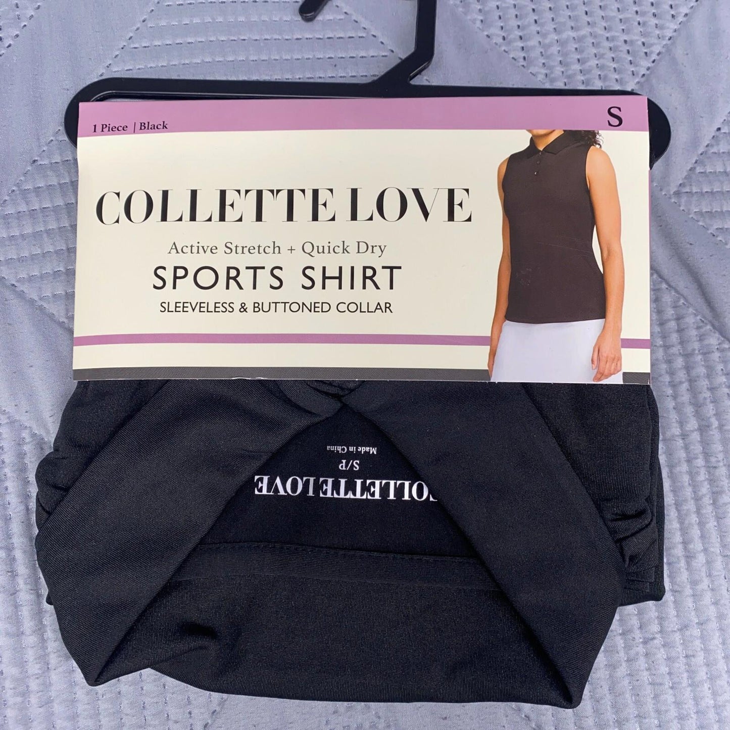 Collette Love sports shirt in black with active stretch and quick dry features.