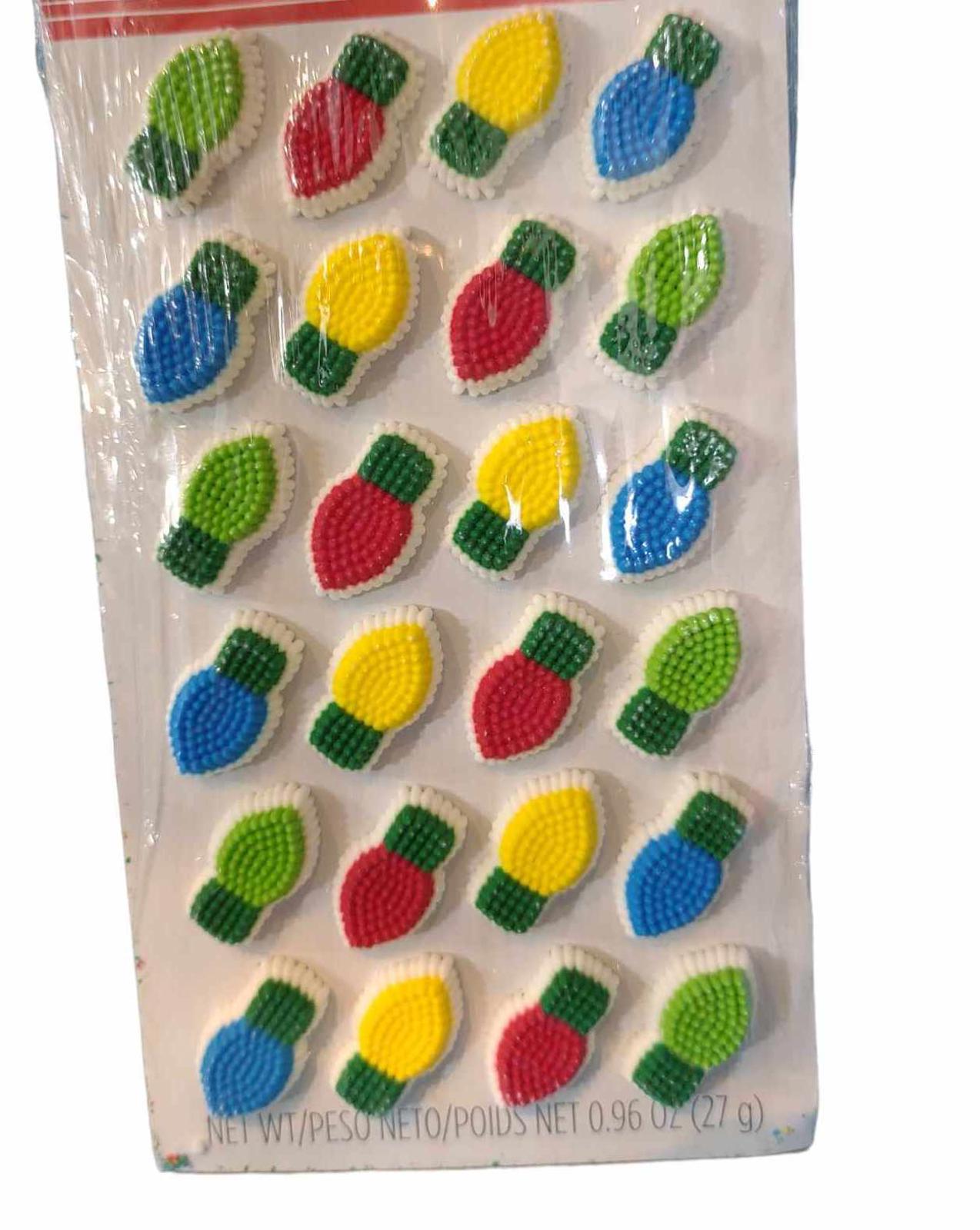 Colorful Christmas light stickers featuring red, green, yellow, and blue designs.