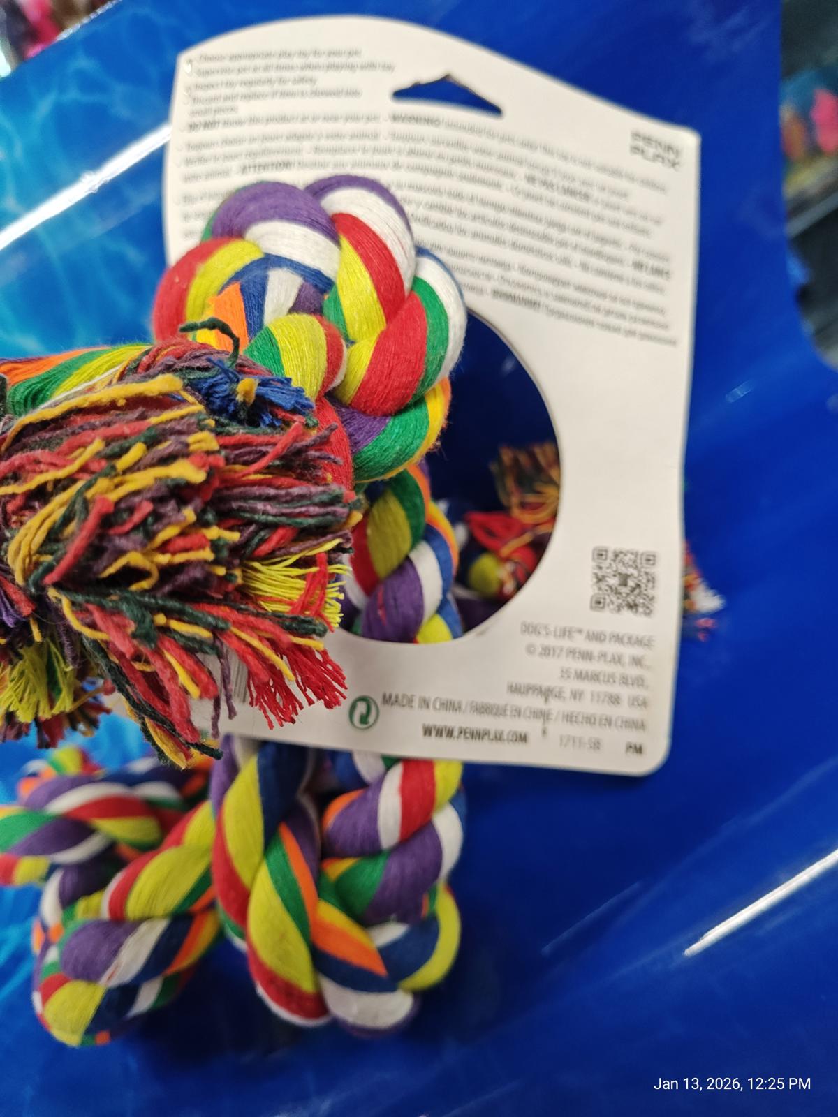 Colorful dog chew toy rope with tassels, perfect for playtime and dental health.