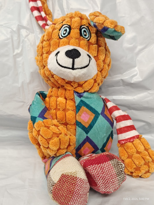 Colorful Plush Toy Bear with patterned body and striped arms.